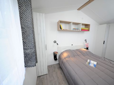 MOBILHOME 2 personnes - Mobilhome Confort 23m² - 1 chambre - terrasse semi-couverte 18m² + BBQ + DRAPS + SERVIETTES 2 pers