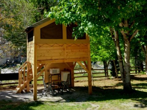 Tente en toile et en bois 2 personnes - Tente baroudeur sur pilotis