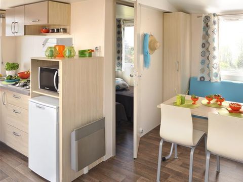 Mobilhome 4 personnes - DIM - LOISIRS CONFORT 2ch/4p - 25m² - Terrasse parasol 4 pers