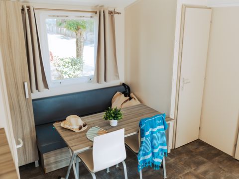 Mobilhome 4 personnes - DIM - LOISIRS CONFORT 2ch/4p - 25m² - Terrasse parasol 4 pers