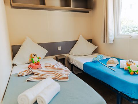Mobilhome 4 personnes - DIM - LOISIR CONFORT 2ch/4p - 25m² - Terrasse couverte 4 pers