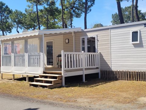 Mobilhome 4 personnes - SUNELIA PRESTIGE + CLIM 2ch / 4p - 34m² - Terrasse couverte