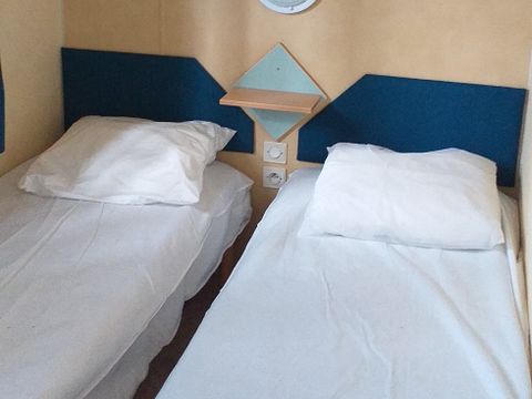 Mobilhome 7 personnes - 2 chambres - 26 m² + terrasse 9 m²