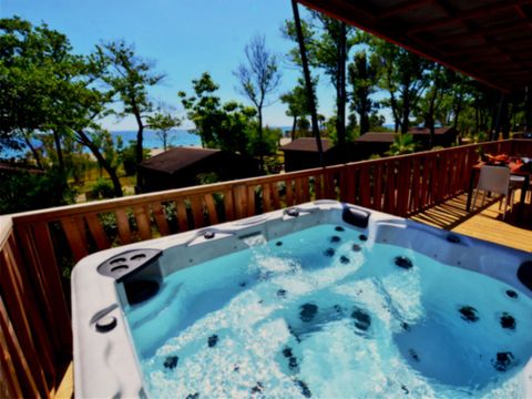 LODGE 9 personnes - Lodge Prestige sur pilotis front mer 7p 3Ch SPA