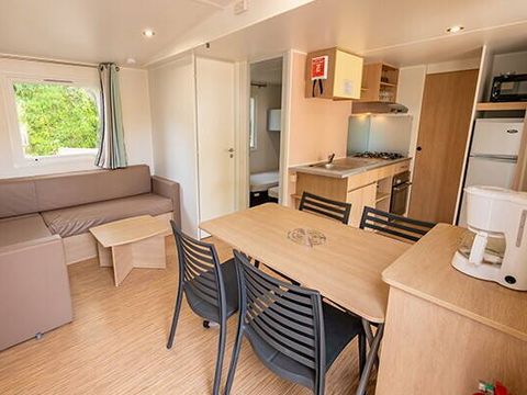 MOBILHOME 6 personnes - Comfort | 2 Chambres | Capacité 4-6 personnes | Terrasse semi couverte | 1 Salle de bain | Climatisation