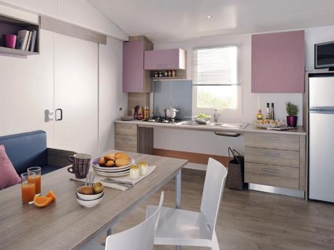MOBILHOME 4 personnes - Mobilhome HELIOS climatisé PMR (Personne à Mobilité Réduite) 32m² + terrasse semi couverte 15m²