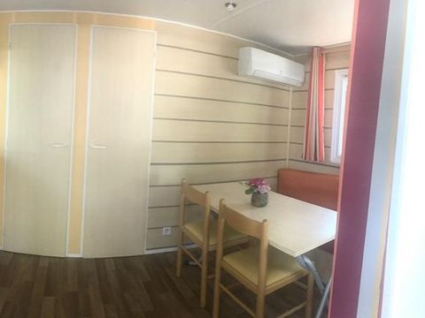 CHALET 3 personnes - Chalet Confort 16 m² - 1 chambre - climatisation (possibilité couchage d'appoint) 2 pers