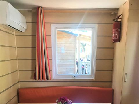 CHALET 3 personnes - Chalet Confort 16 m² - 1 chambre - climatisation (possibilité couchage d'appoint) 2 pers