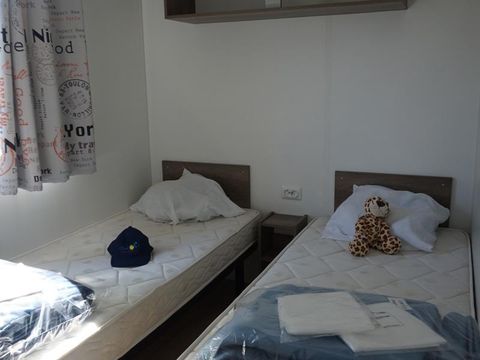 MOBILHOME 6 personnes - C- Mobil-home caraïbes climatisé 2 chambres