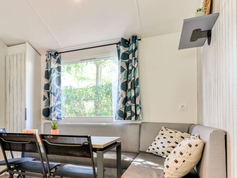 MOBILHOME 4 personnes - 2 chambres - 4 personnes, terrasse semi-couverte, Clim TV