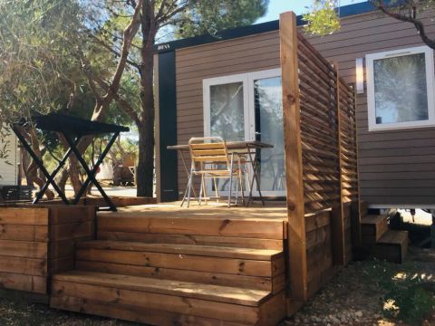 Mobilhome 2 personnes - Cahita 17.80m² - 1 chambre - Lit fait à l'arrivée+TV - Climatisation+Terrasse 10m²+wifi