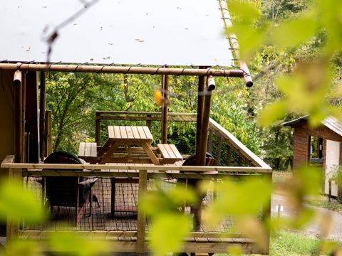 Tente en toile et en bois 6 personnes - Tente LODGE LUXE XL LUXE SAFARI 61m²  3 Chambres - Terrasse couverte