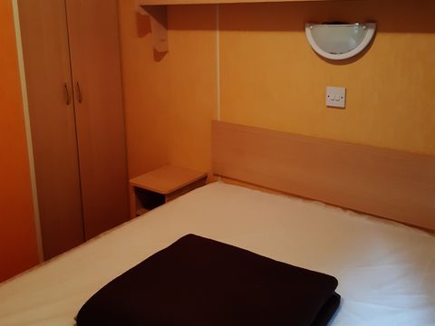MOBILHOME 4 personnes - 24m2, 2 chambres ( n°24 et n°27) terrasse intégrée