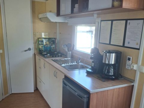 Mobilhome 4 personnes - Confort Climatisation Réversible - Terrasse - 2 chambres - 24m² / Palmier et Olivier
