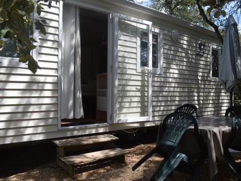 Mobilhome 4 personnes - Confort Climatisation Réversible - Terrasse - 2 chambres - 21m² / Genévrier - Mûrier et Pin d'Alep