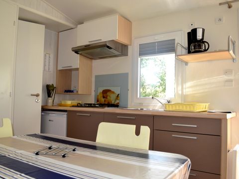 Mobilhome 4 personnes - Confort Climatisation Réversible - Terrasse - 2 chambres - 21m² / Genévrier - Mûrier et Pin d'Alep