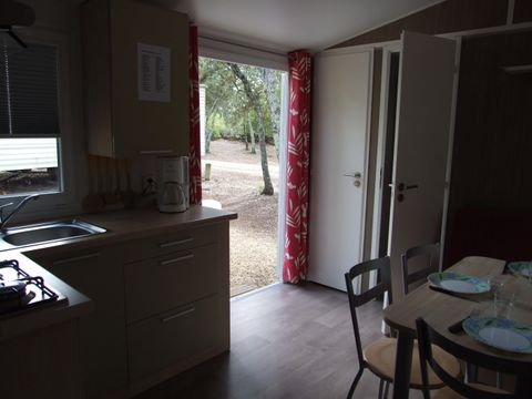 Mobilhome 4 personnes - Confort Climatisation Réversible - Terrasse - 2 chambres - 26.52m² / Chêne Vert