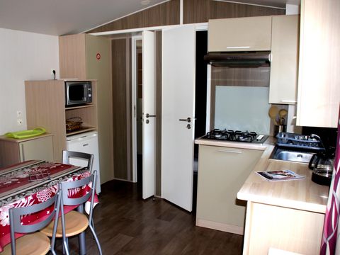 Mobilhome 4 personnes - Confort Climatisation Réversible - Terrasse - 2 chambres - 26.52m² / Chêne Vert