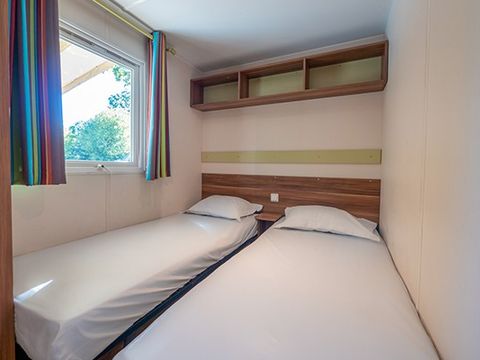 MOBILHOME 4 personnes - Comfort | 2 Ch. | 4 Pers. | Terrasse surélevée | 1 SDB | Clim. | TV