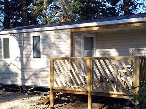 MOBILHOME 4 personnes - Loggia Confort 22m² - 2 chambres + climatisation + TV - dont terrasse semi-couverte de 6m² 4PERS 2/4 pers