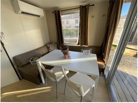 BUNGALOW 4 personnes - 2 chambres climatisé - 33m2 + terrasse couverte