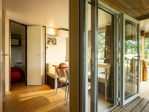 BUNGALOW 4 personnes - 2 chambres climatisé - 33m2 + terrasse couverte