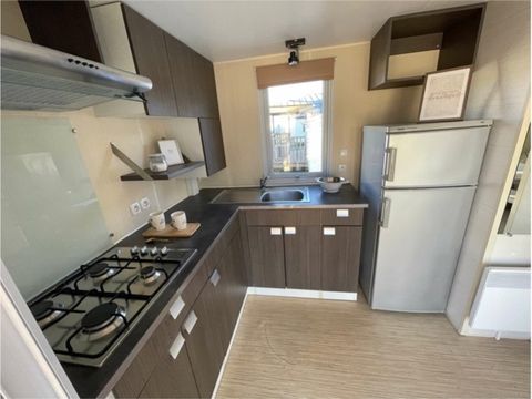 BUNGALOW 4 personnes - 2 chambres climatisé - 33m2 + terrasse couverte
