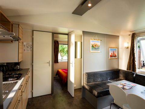 BUNGALOW 4 personnes - 2 chambres climatisé - 31m2 + terrasse couverte