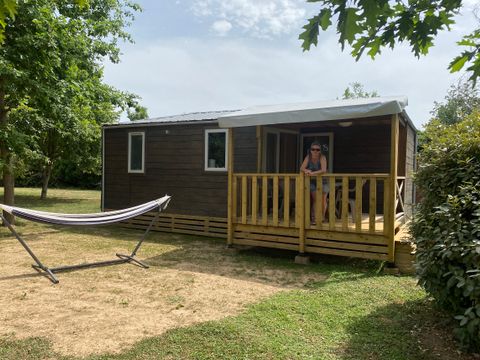 BUNGALOW 4 personnes - 2 chambres climatisé - 31m2 + terrasse couverte
