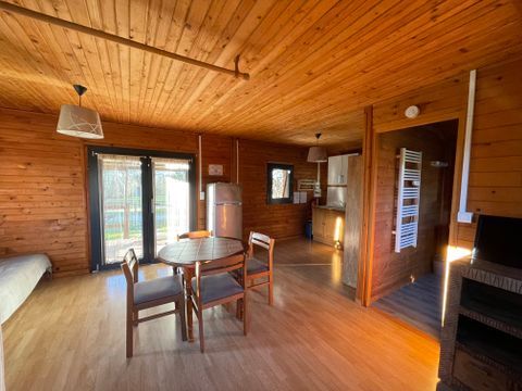 CHALET 4 personnes - CHALET LOFT CONFORT - 1 grande pièce -  clim - TV - BBQ - Ménage* - 35m2 + terrasse couverte de 14m2