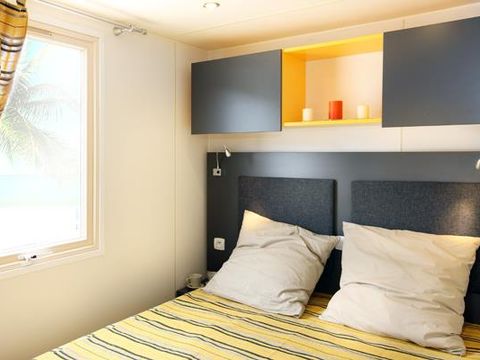 MOBILHOME 4 personnes - COTTAGE 2 chambres (TV - terrasse couverte 7m² - superficie 26m²)