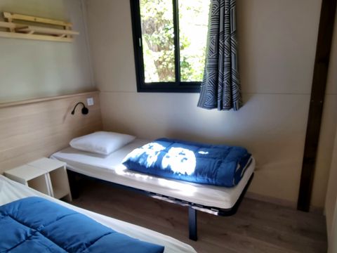 Chalet 6 personnes - Confort 35m² - 3 chambres - Climatisation - Terrasse semi-couverte