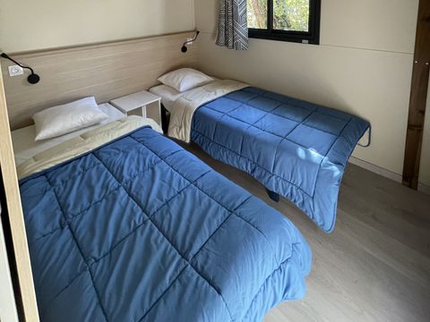 Chalet 6 personnes - Confort 35m² - 3 chambres - Climatisation - Terrasse semi-couverte