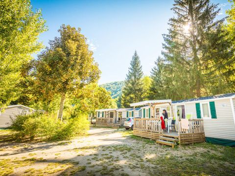Mobilhome 1/6 personnes - Orchidée Grand Confort 35m² - 2 chambres - Terrasse couverte - CLIM - TV - Lave-vaisselle