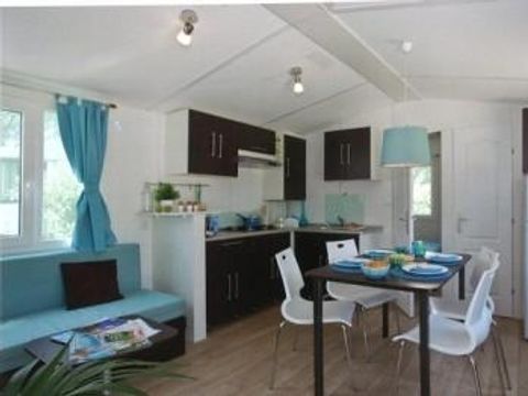 Mobilhome 1/6 personnes - Orchidée Grand Confort 35m² - 2 chambres - Terrasse couverte - CLIM - TV - Lave-vaisselle
