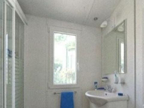 Mobilhome 1/6 personnes - Orchidée Grand Confort 35m² - 2 chambres - Terrasse couverte - CLIM - TV - Lave-vaisselle