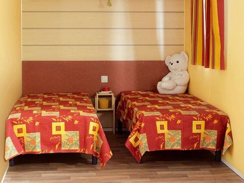 Mobilhome 6/8 personnes - Titania Confort 32m² - 3 chambres - Terrasse couverte
