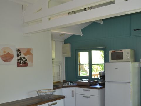 Hébergement 4 personnes - Chalet sur pilotis - 2 chambres - Bord de rivière