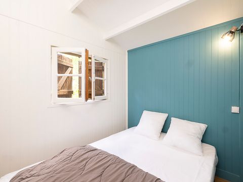 Hébergement 4 personnes - Chalet sur pilotis - 2 chambres - Bord de rivière