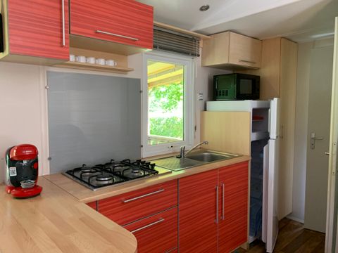 MOBILHOME 5 personnes - Super Mercure 30m² - 2 chambres avec une terrasse couverte