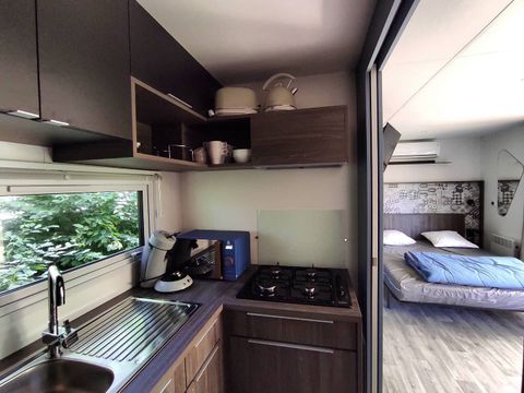 MOBILHOME 3 personnes - Hôtelier 1 pièce (lit 160 + banquette) DIM/DIM