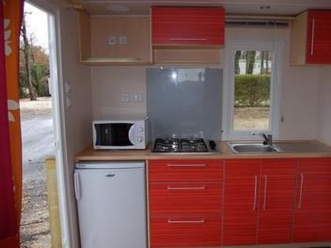 MOBILHOME 2 personnes - Mobil-home Standard 18 - 24m² - 1 chambre - terrasse couverte + TV* 2 pers