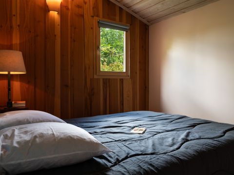 Chalet 2 personnes - Eco-cabane en bois, avec sanitaires (possible de venir à 4 personnes avec supplément au camping)