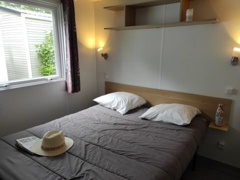 Mobilhome 4 personnes - LOCATION - TI 26m² avec terrasse semi-couverte - 2 chambres - CONFORT