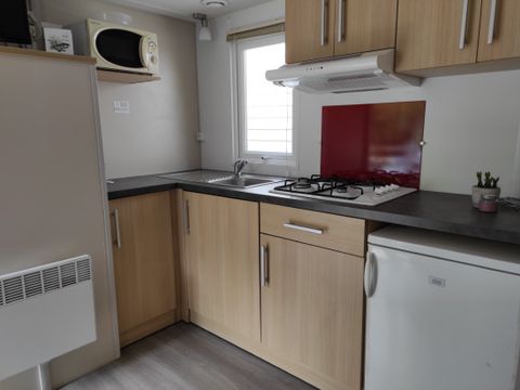 Mobilhome 4 personnes - LOCATION - TI 26m² avec terrasse semi-couverte - 2 chambres - CONFORT