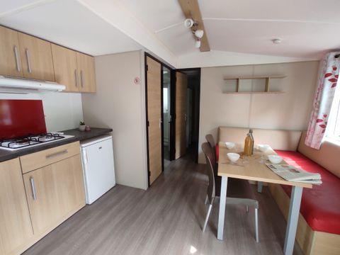 Mobilhome 4 personnes - LOCATION - TI 26m² avec terrasse semi-couverte - 2 chambres - CONFORT