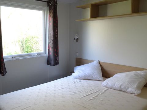 Mobilhome 4 personnes - LOCATION - TI 26m² avec terrasse semi-couverte - 2 chambres - CONFORT