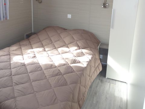 Mobilhome 4 personnes - LOCATION - TI 26m² avec terrasse semi-couverte - 2 chambres - CONFORT