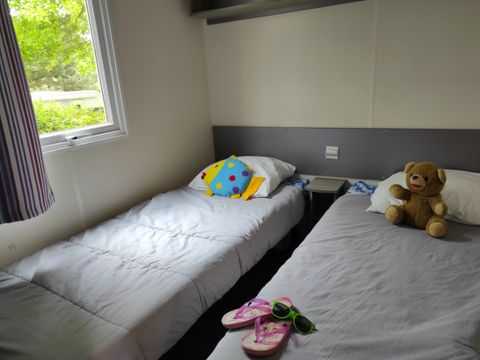 Mobilhome 4 personnes - LOCATION 28m² - 2 chambres - TV - CONFORT