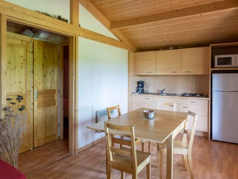 Chalet 4 personnes - Sapin - 2 chambres - Personnes supplémentaires possible en supplément - Contacter le camping